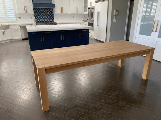 Exposed leg Parsons Table