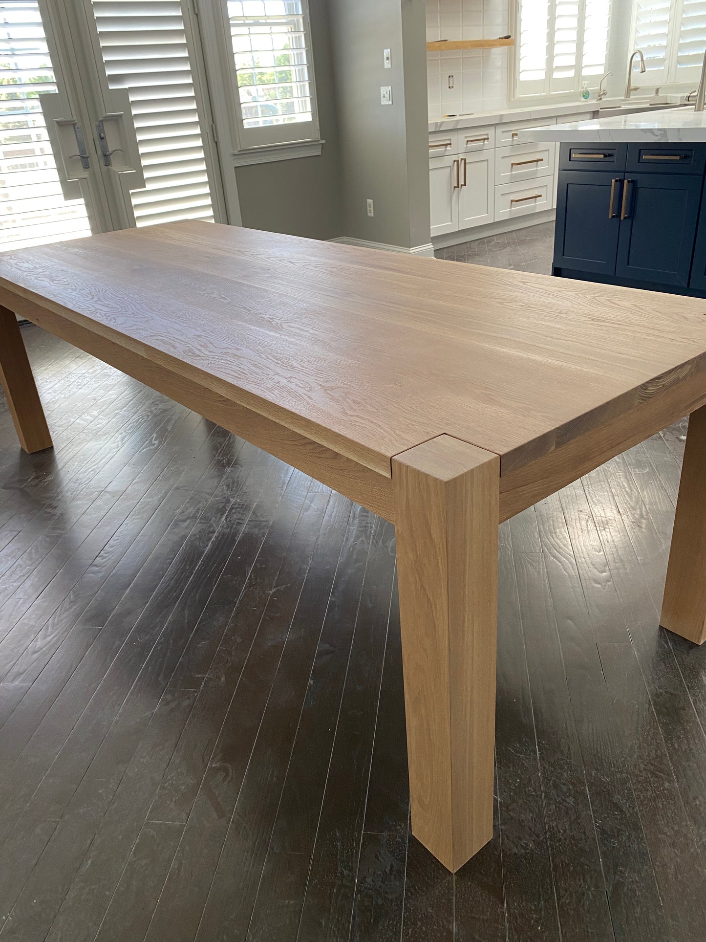 Exposed leg Parsons Table