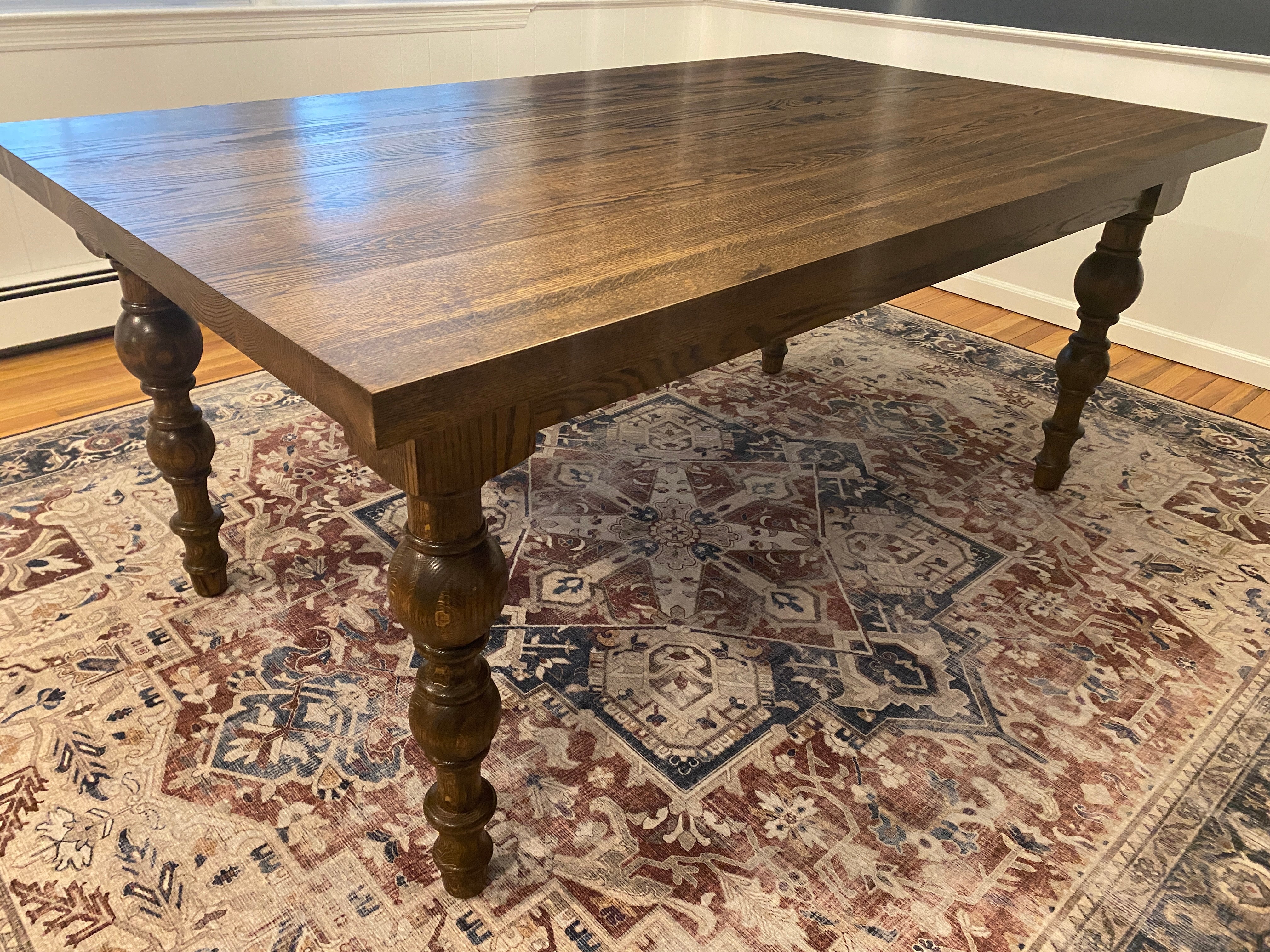 Solid wood turned leg dining deals table